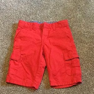 Red Levi’s shorts